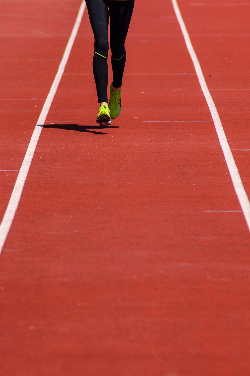 running track person running on track field sports
